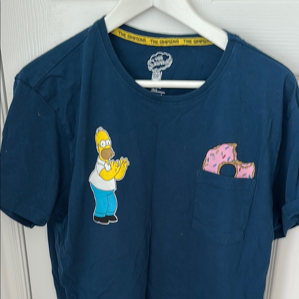 Official Simpson’s Matt Groening “Donut Pocket” Navy Blue T-Shirt. Mens L
